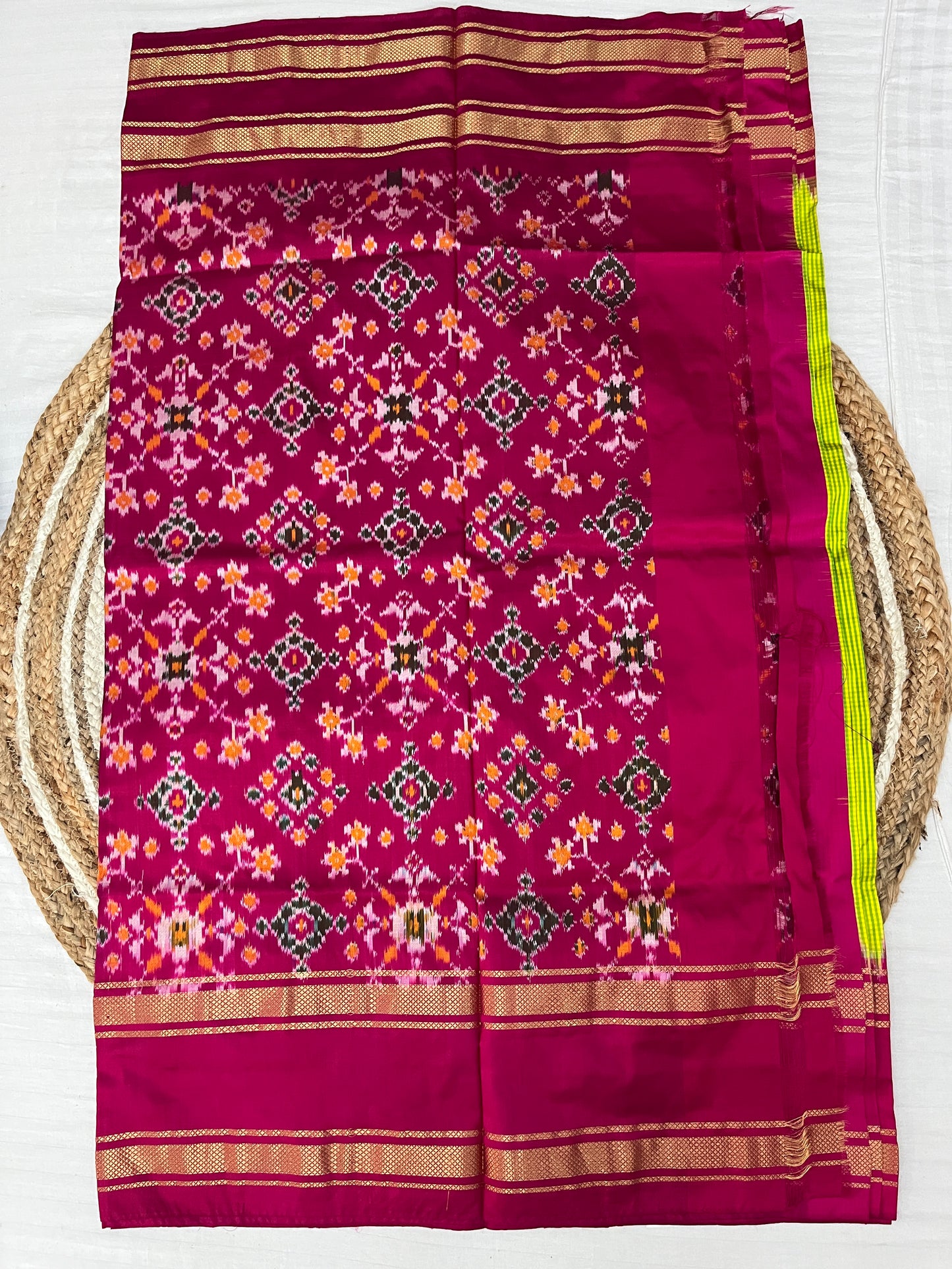 Green and Magenta Ikkat Patola Silk Saree
