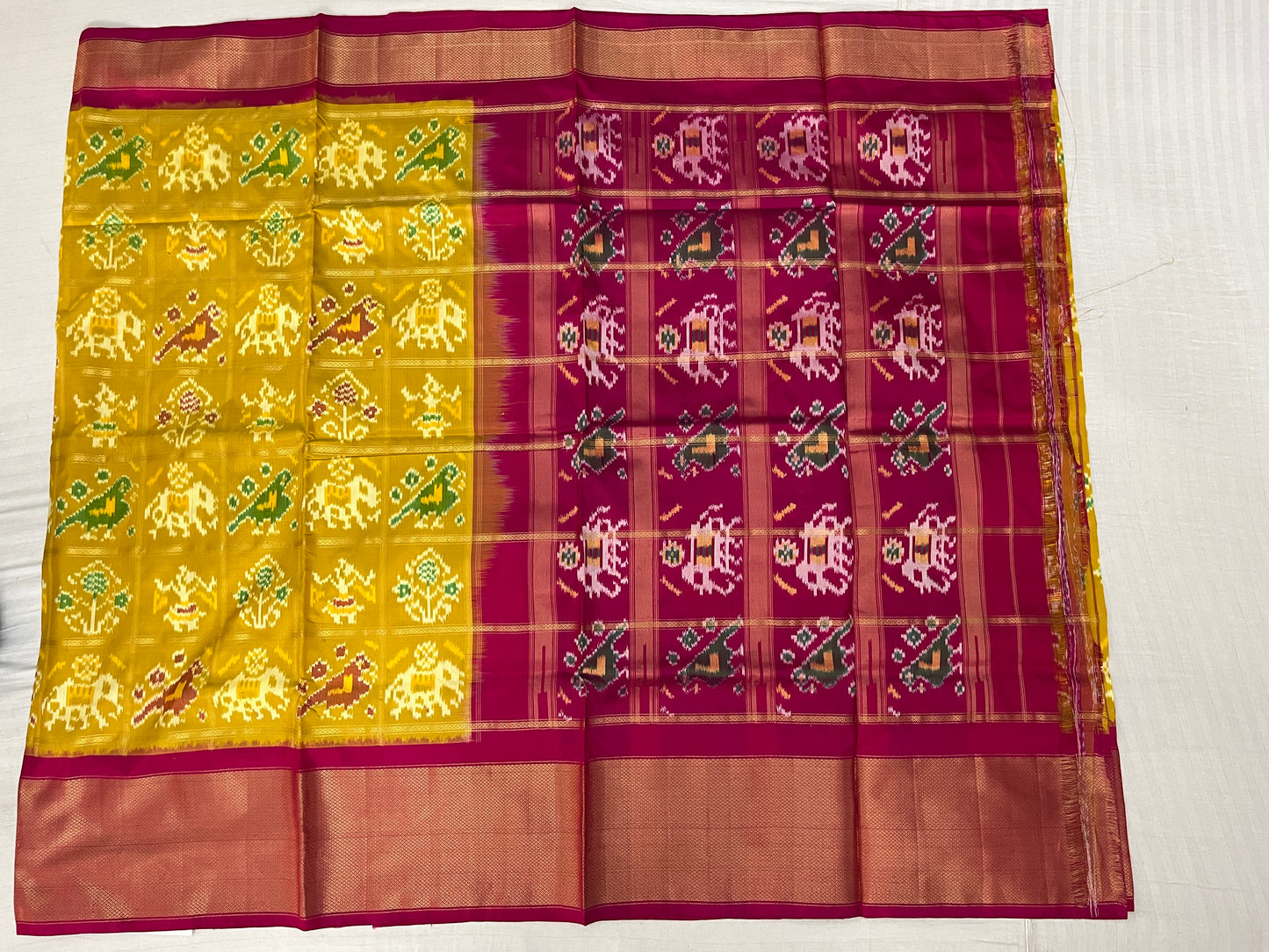 Mustard Yellow and Magenta Ikkat Patola Silk Saree