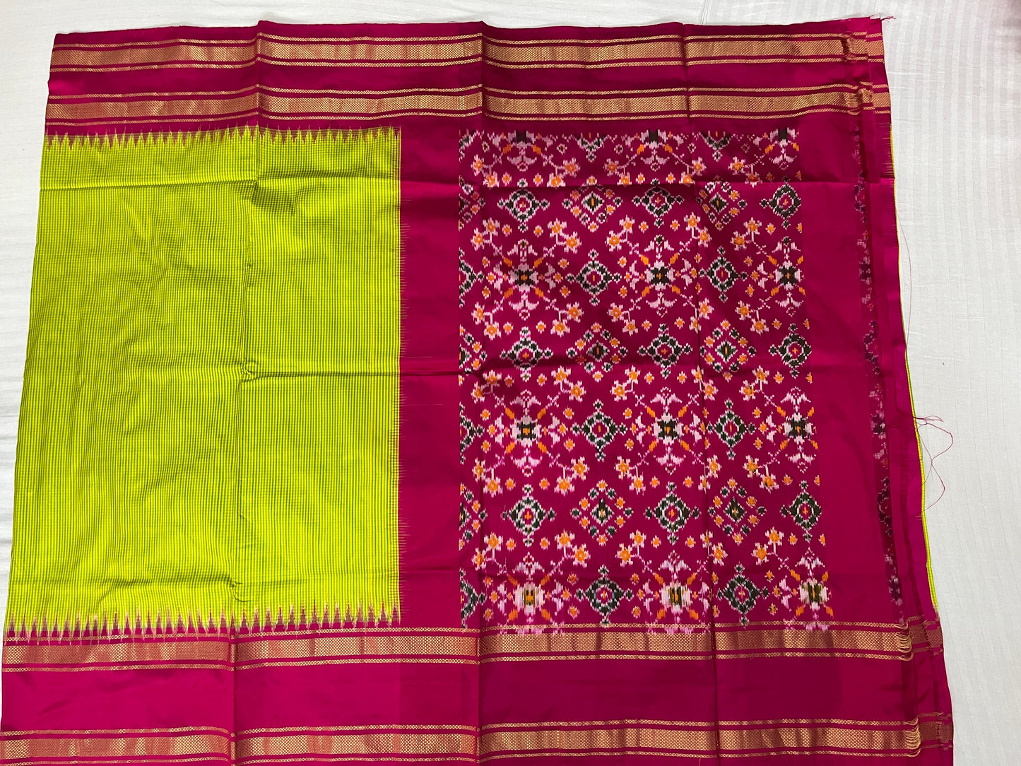 Green and Magenta Ikkat Patola Silk Saree